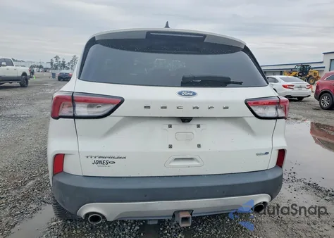 2020 Ford Escape Titanium z USA, uszkodzony, nr VIN 1FMCU9J93LUB56173